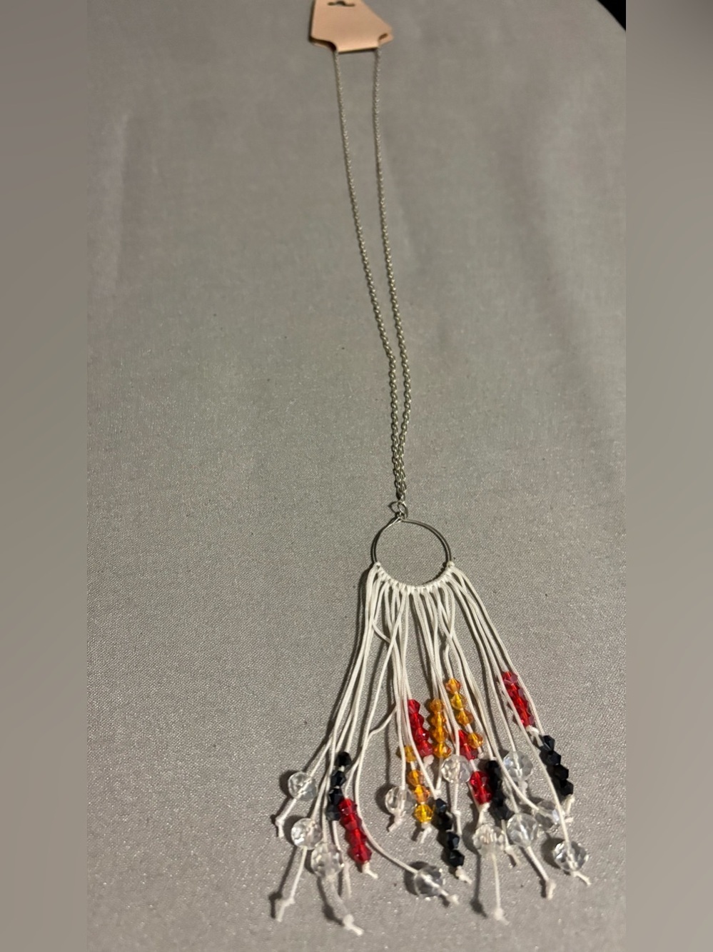 Beaded Tassel Pendant Necklace in Red, Black, Gold, and Clear.